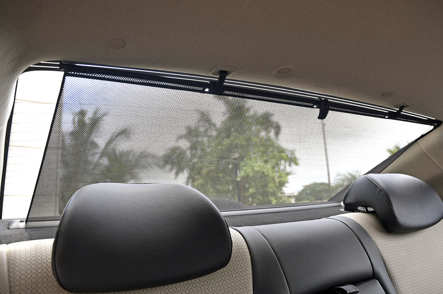 Rear manual curtains