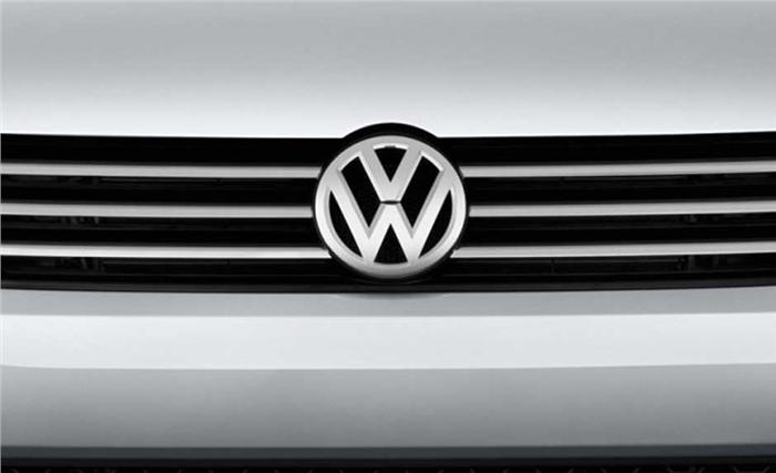VW to cut annual investment by €1bn