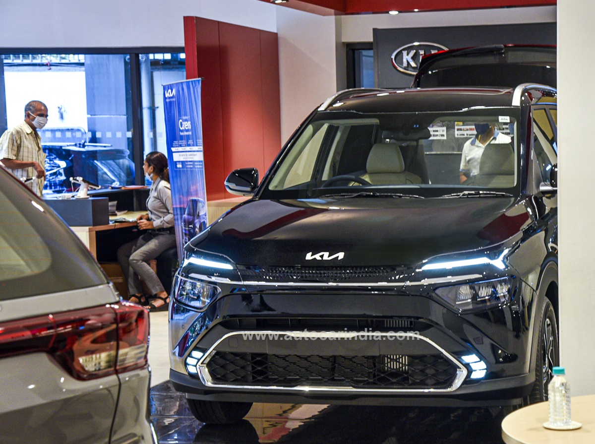 Kia Carens in showroom. 