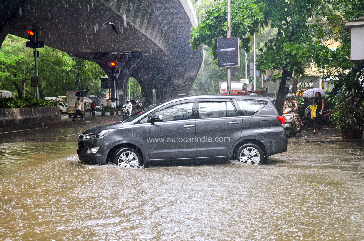 Toyota Innova Crysta driving through flood