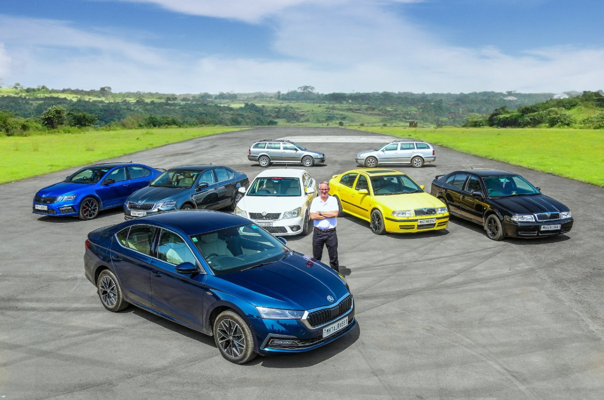 Zac Hollis with all generations of the Skoda Octavia.