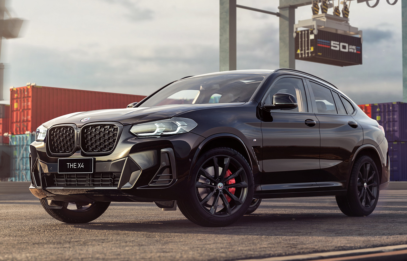 2022 BMW X4 M Sport 50 Jahre M Edition front three quarter.