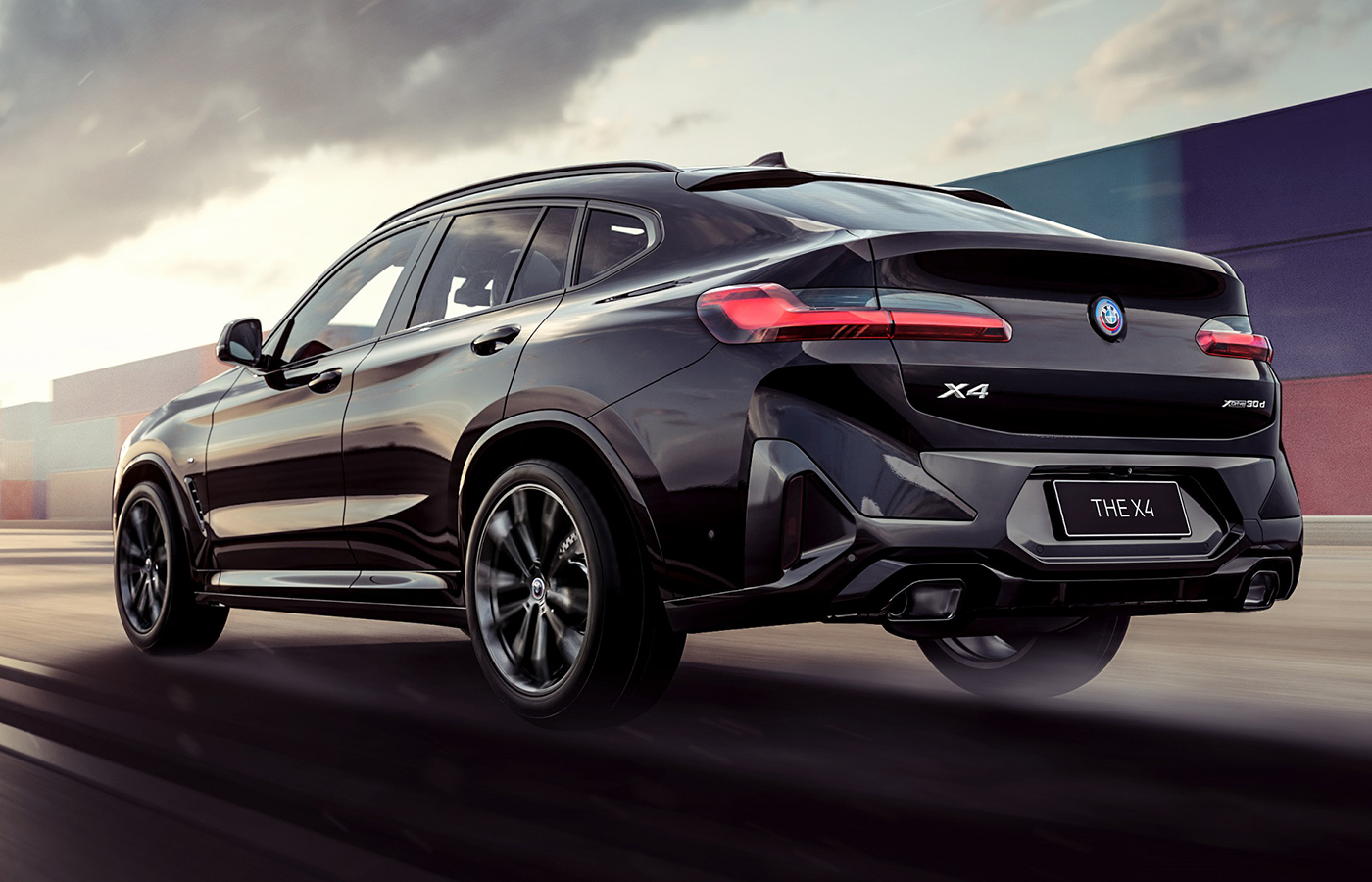 2022 BMW X4 M Sport 50 Jahre M Edition rear quarter.