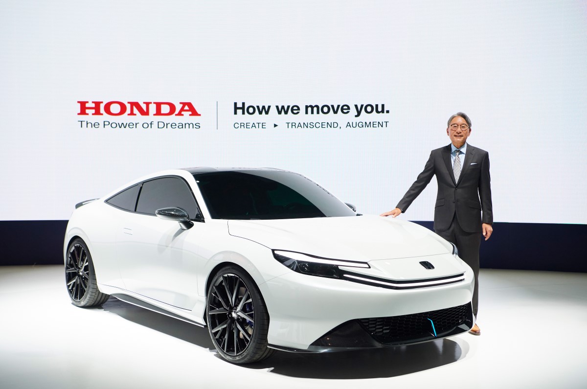 Honda President & CEO Toshihiro Mibe with the Honda Prelude Concept at 2023 Japan Mobility Show