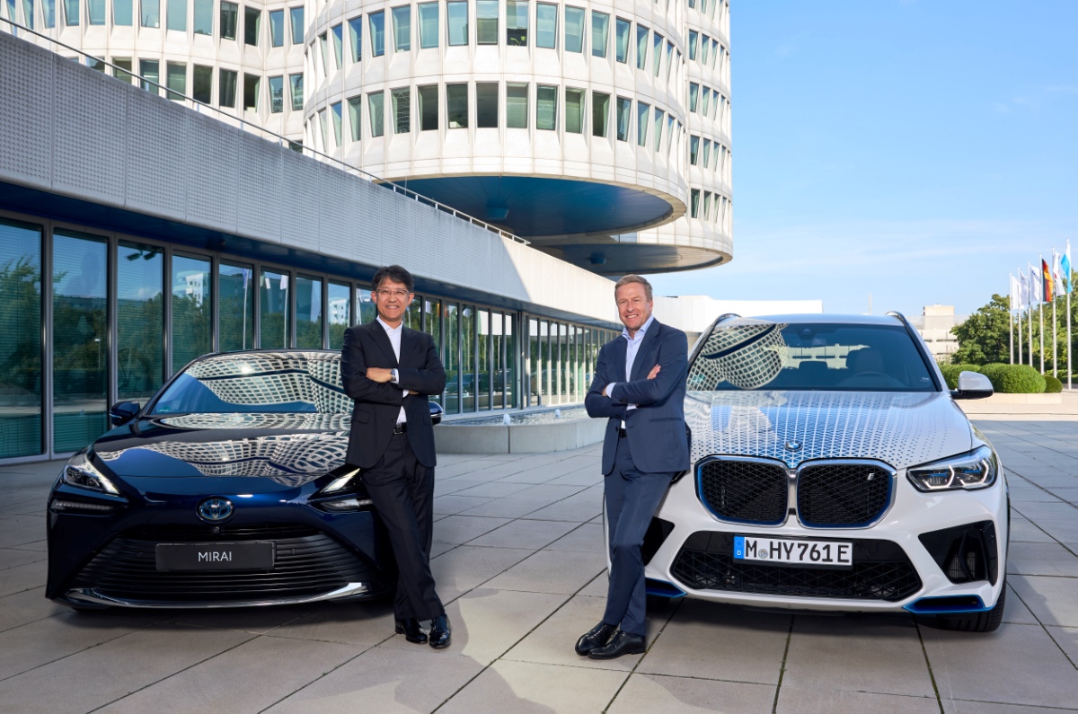 Toyota president Koji Sato (left) with BMW head Oliver Zipse