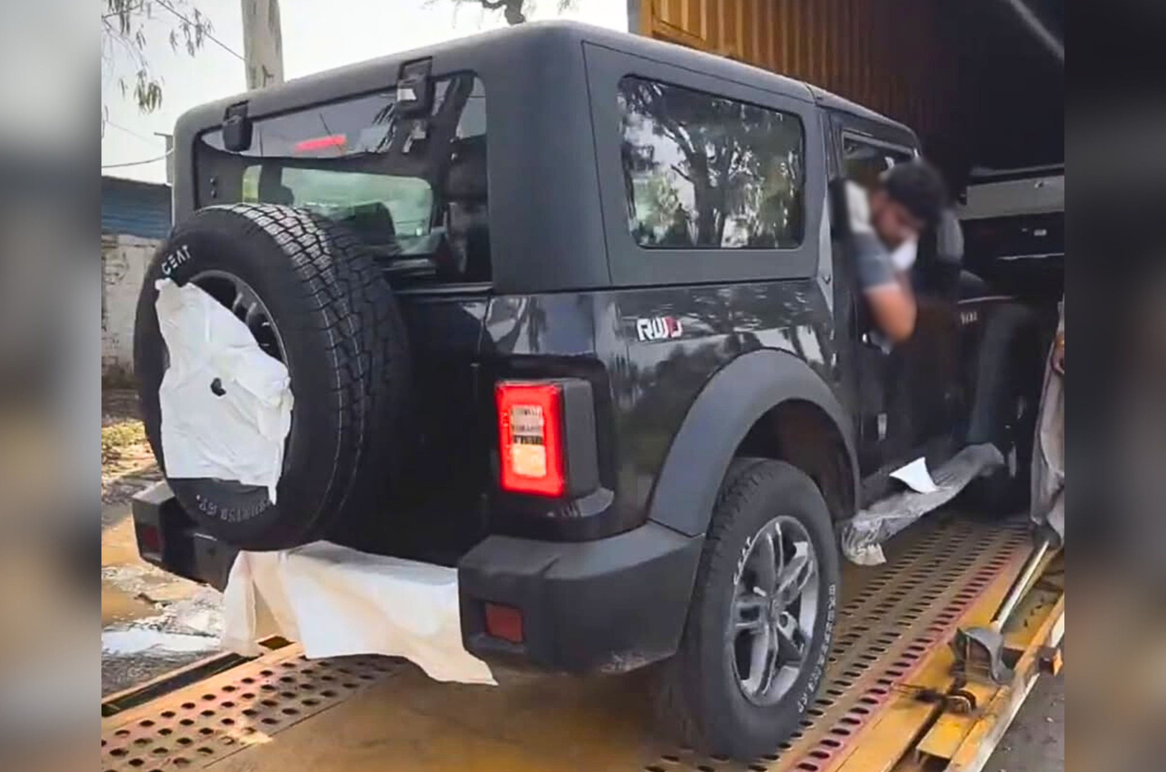 new mahindra thar facelift rear three quarter