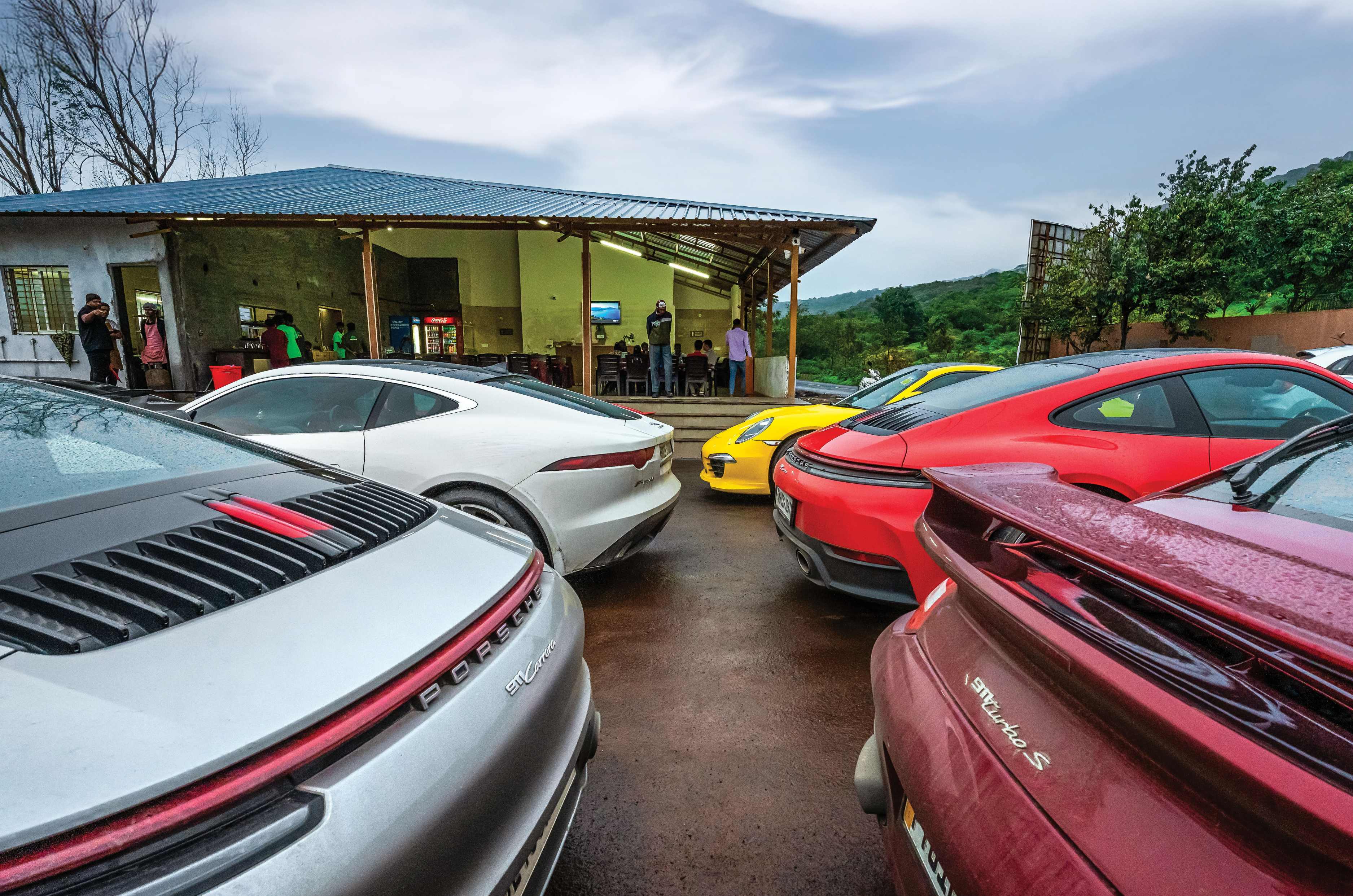 Multiple Porsches parked