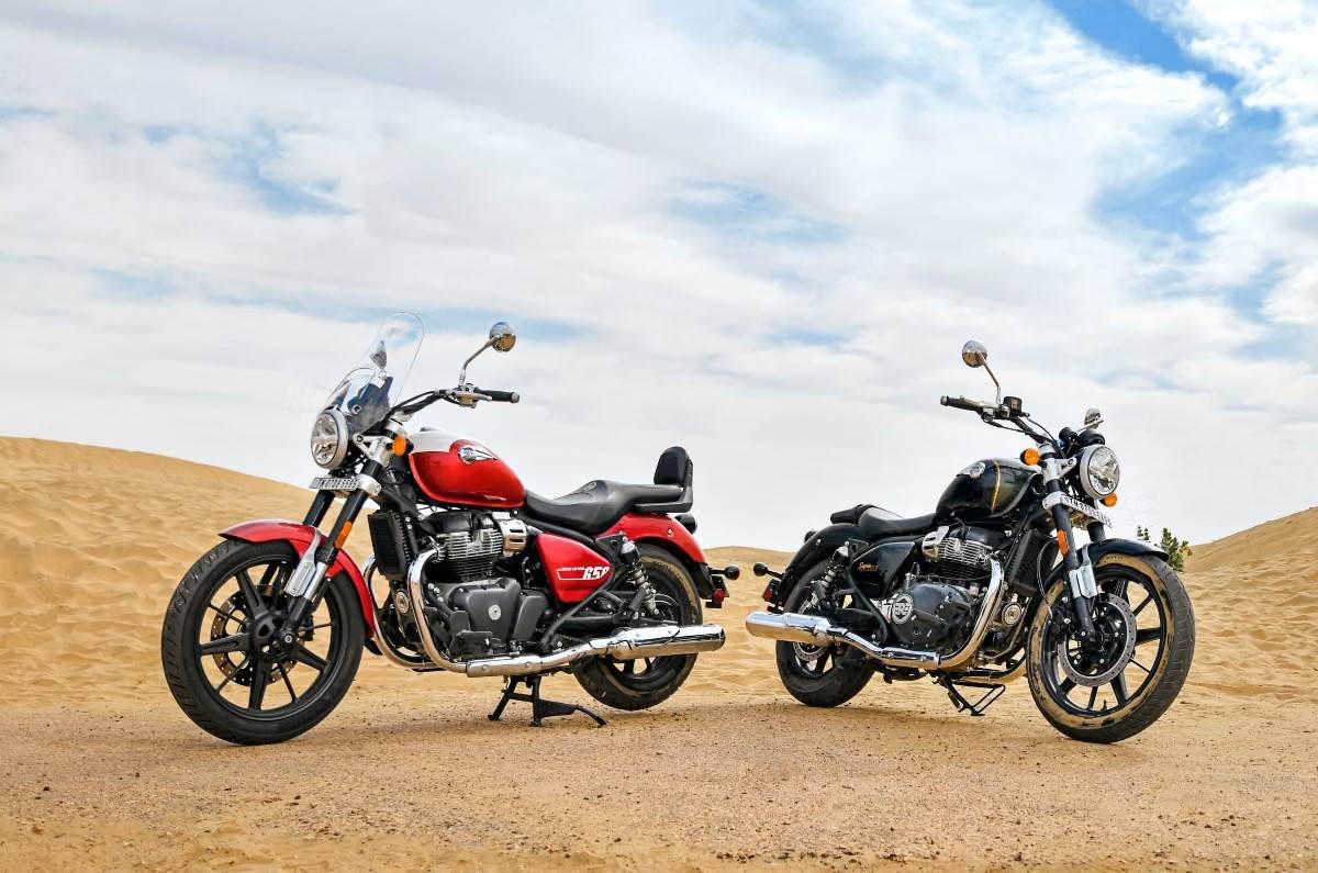 Two Royal Enfield Super Meteors side by side in field