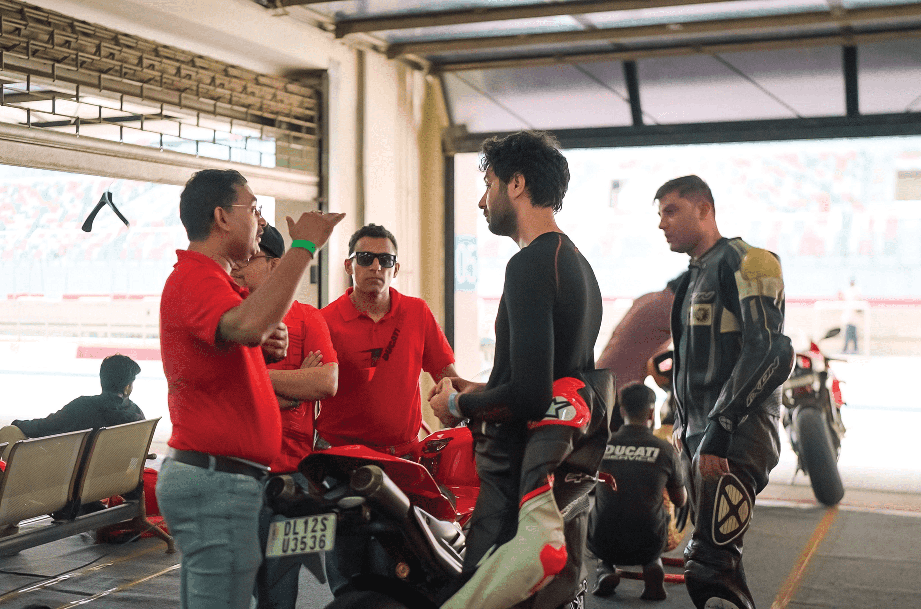 Ducati Panigale V4 S and the brand's top officials