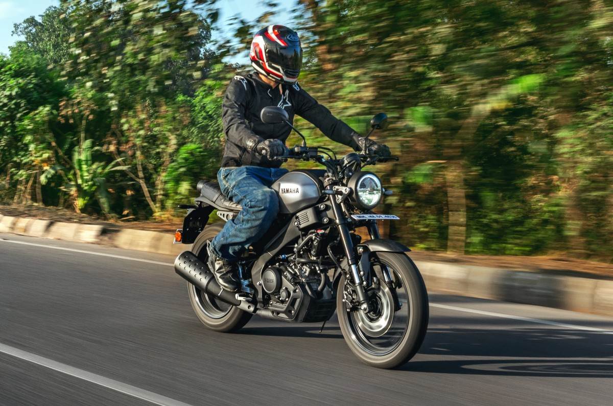 Yamaha XSR155 front right side riding shot on road