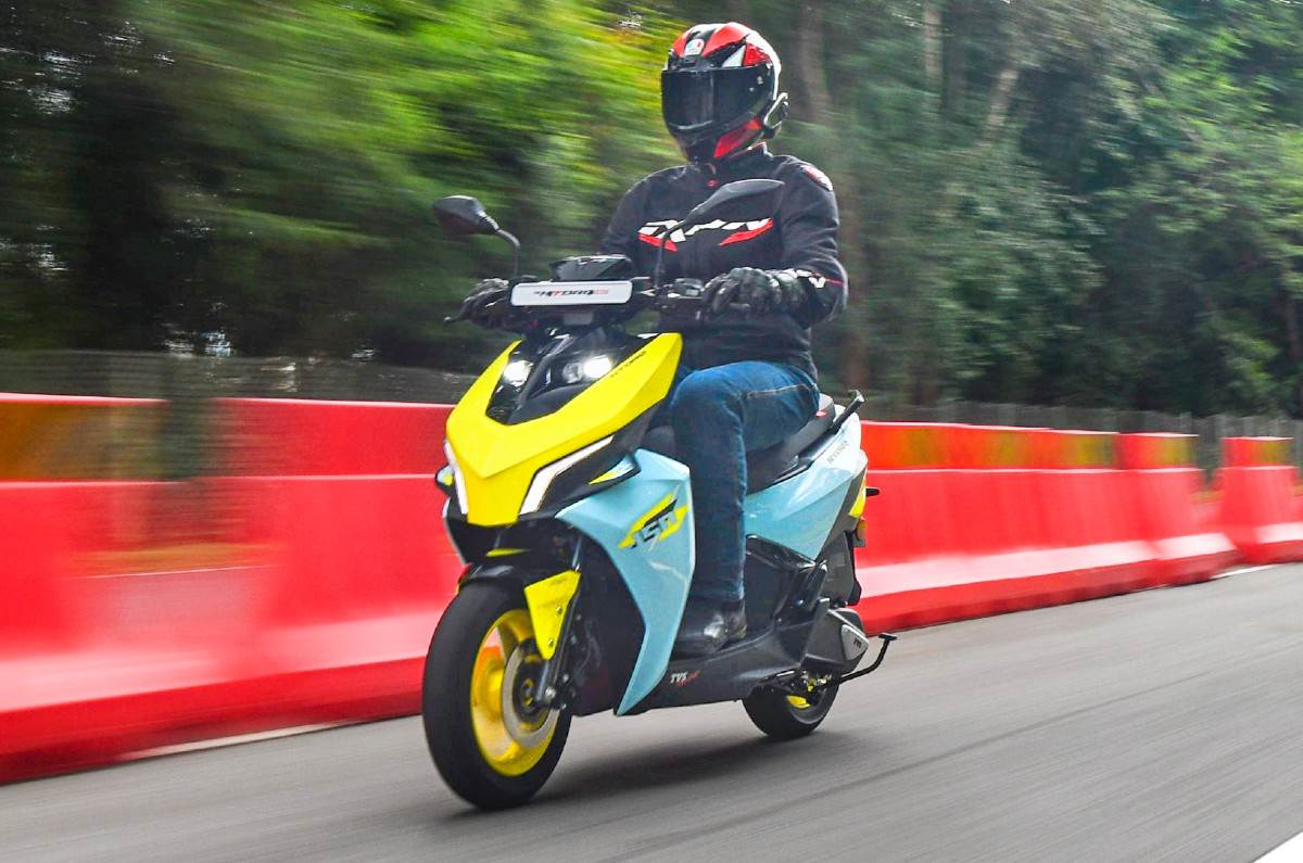 TVS Ntorq 150 front left side riding shot on track