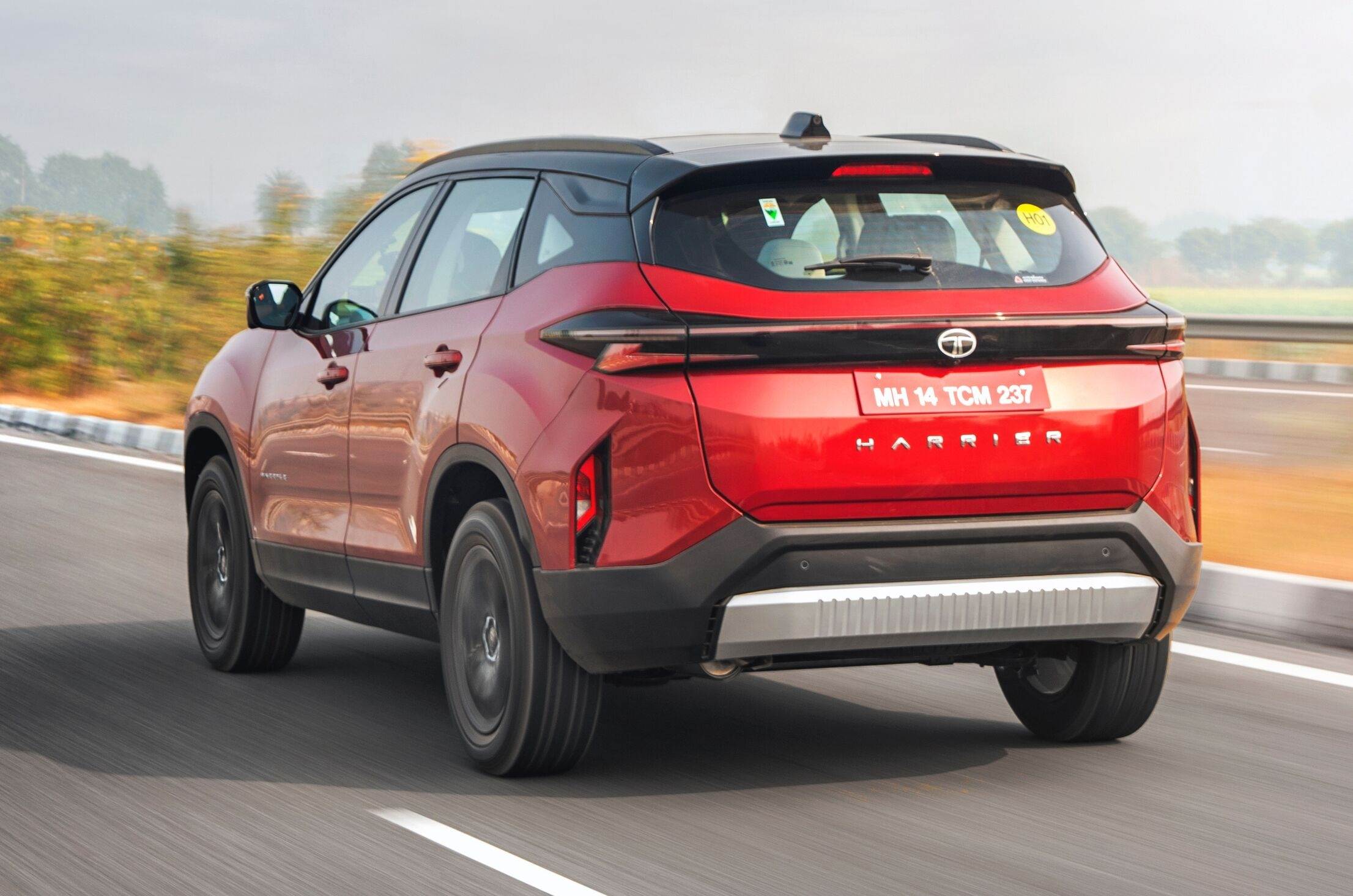 Tata Harrier petrol rear left side on road driving