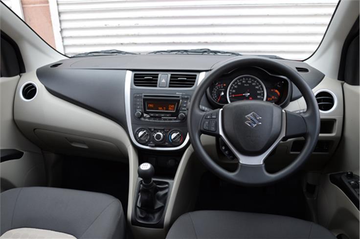 Dashboard looks upmarket, steering wheel shared with higher Maruti models like the swift. 