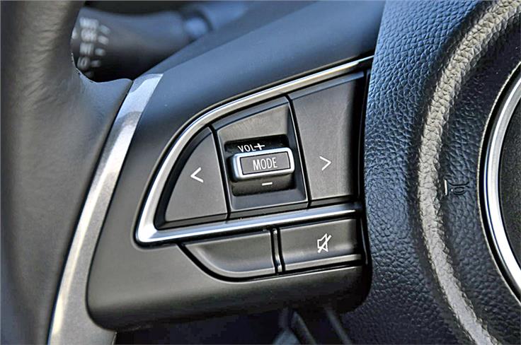 Steering buttons shared with newer Suzukis such as the Ignis and Dzire. 