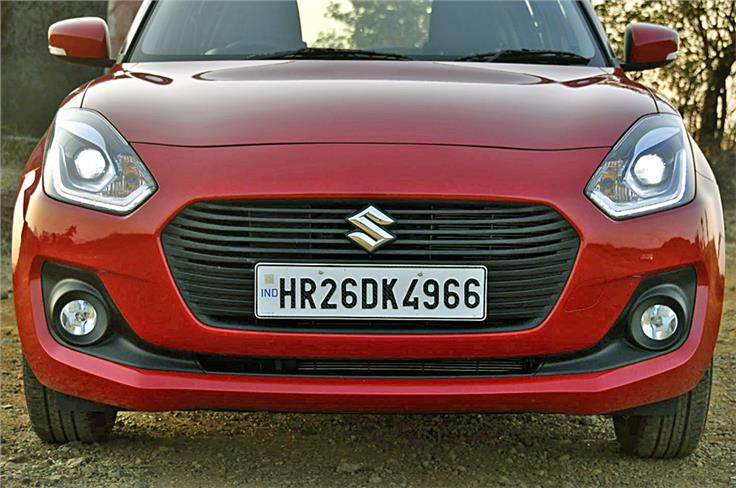 The new Swift shares much of its nose with the Dzire but the hatchback's shapelier bumper makes it look far sportier.  