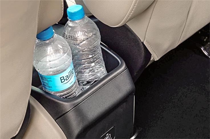 Bottle holders everywhere. Single USB charging port for back seat.