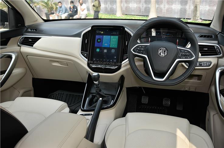 The dashboard layout remains unchanged, with the 10.4-inch portrait-oriented touchscreen taking centre stage. 