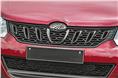 The toothy grille is a Mahindra-typical design element.