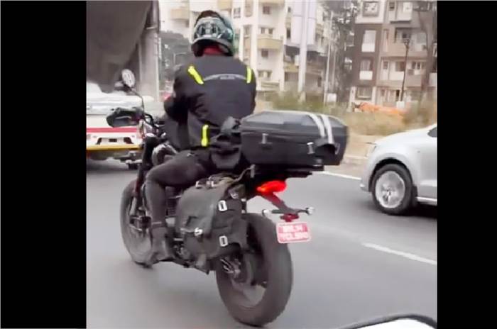 Bajaj Triumph bike spied testing with luggage, wire-spoke rims.