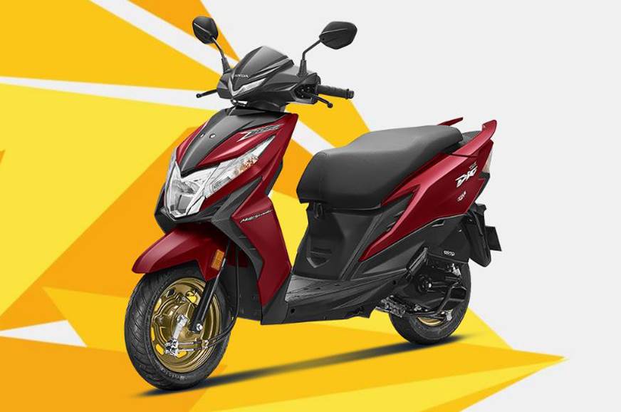 Honda dio golden discount colour