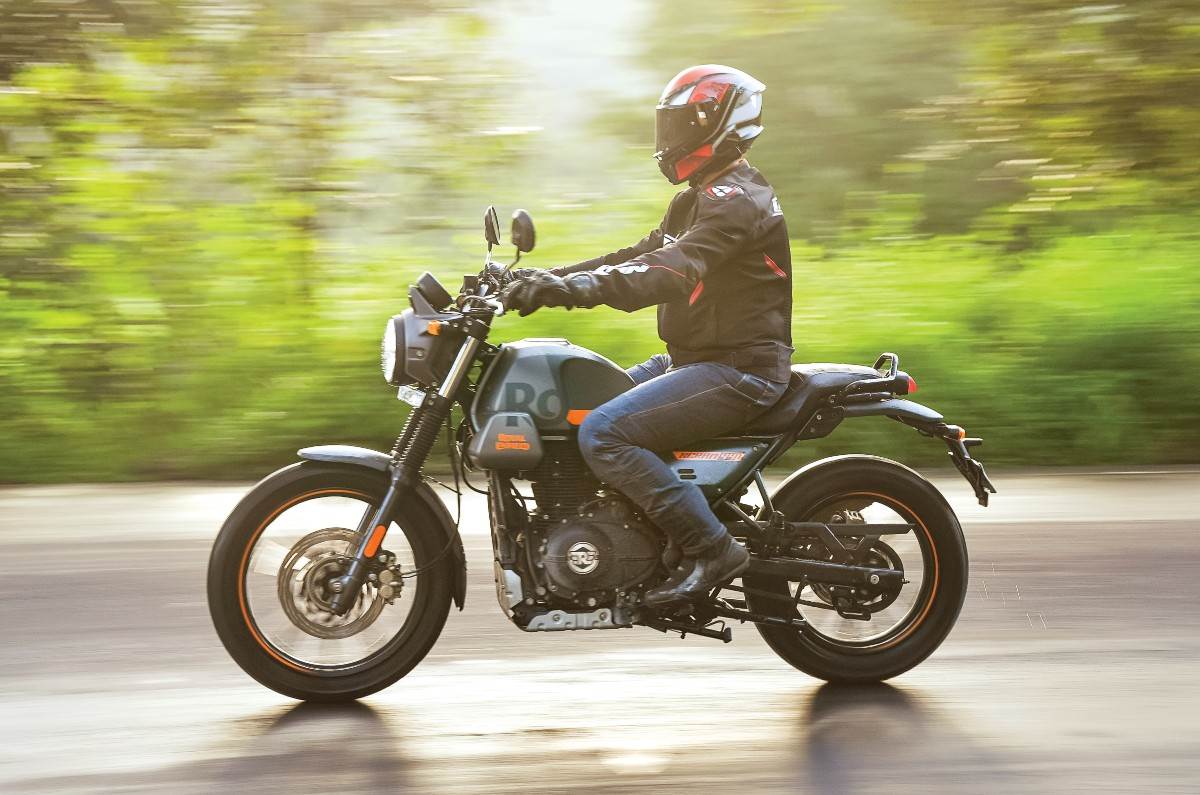 Royal Enfield Scram 440 left side profile riding shot Royal Enfield Scram 440 left side profile riding shot