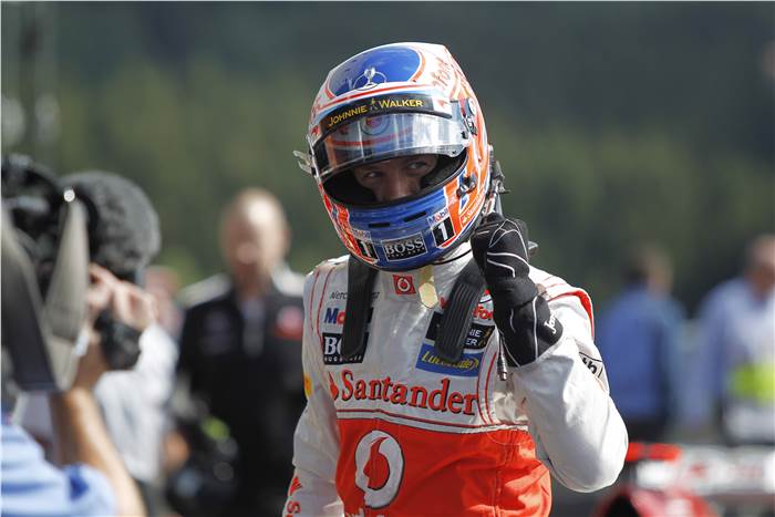 Button storms to pole at Belgian GP