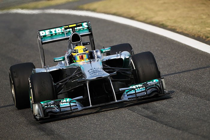 Hamilton grabs first pole with Mercedes