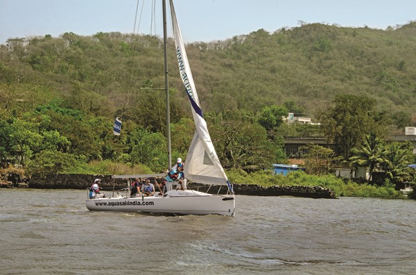 Sun vs wind: Mahindra e2o takes on a sail boat