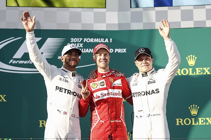 Australian GP: Vettel jumps Hamilton for first 2017 win