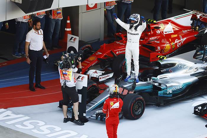 Russian GP:  Bottas resists Vettel for maiden F1 win