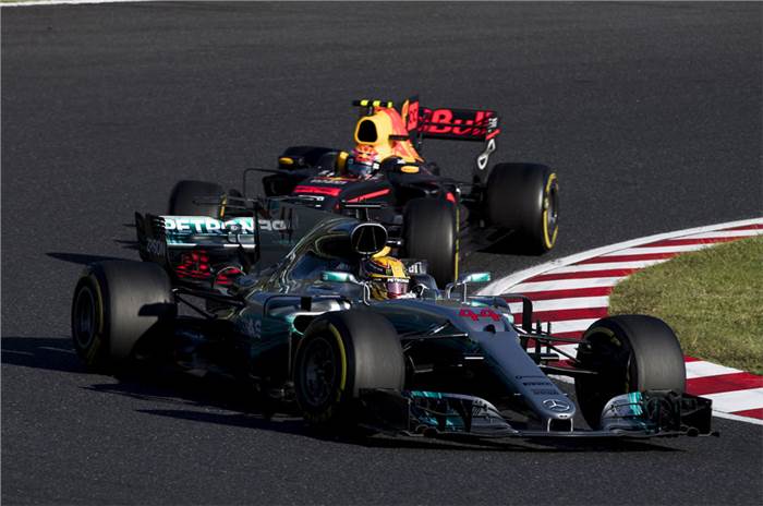Hamilton wins Japanese GP as Vettel faces another setback