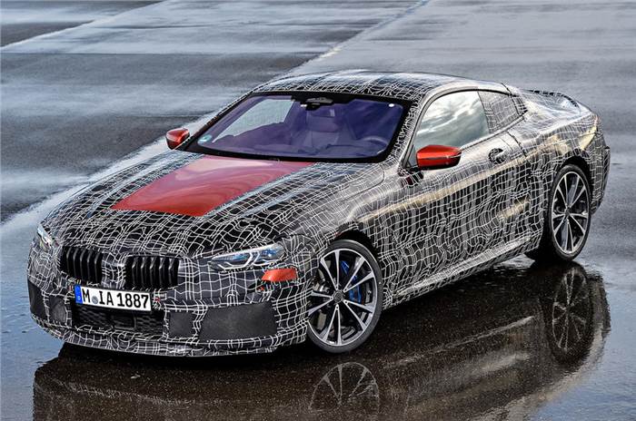 BMW 8-series officially revealed in light camouflage