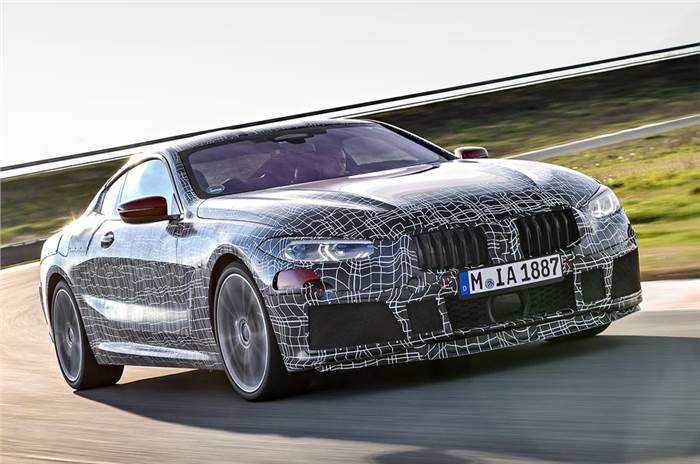 BMW 8-series officially revealed in light camouflage