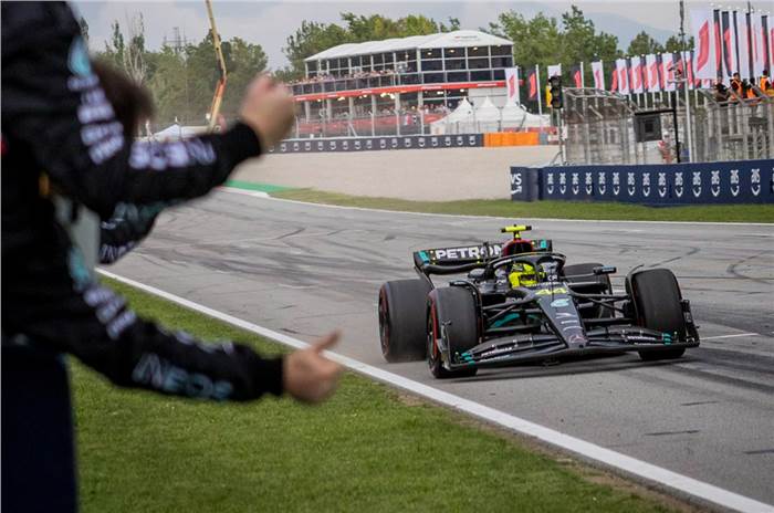 Lewis Hamilton crosses chequered flag at Spanish GP
