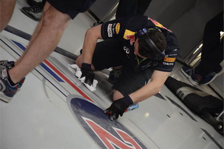 Mark Webber&#8217;s garage floor being wiped spanking-clean right after he left the garage.