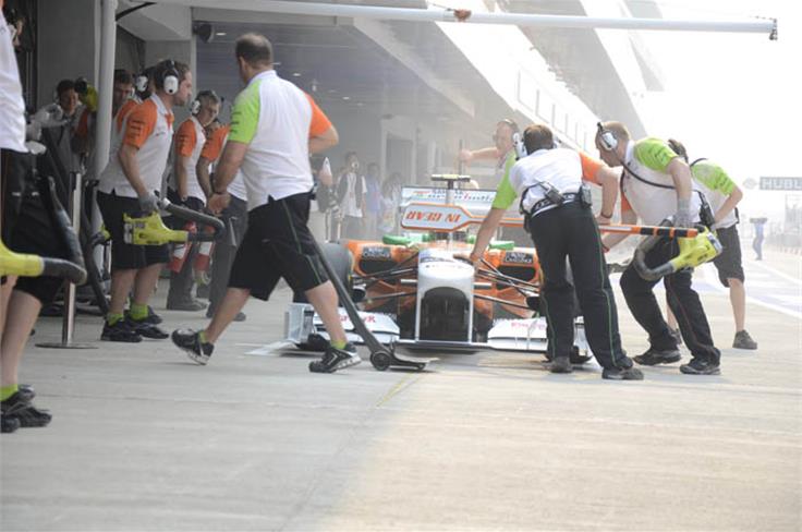 Force India team ready to wheel Paul Di Resta back into the garage.