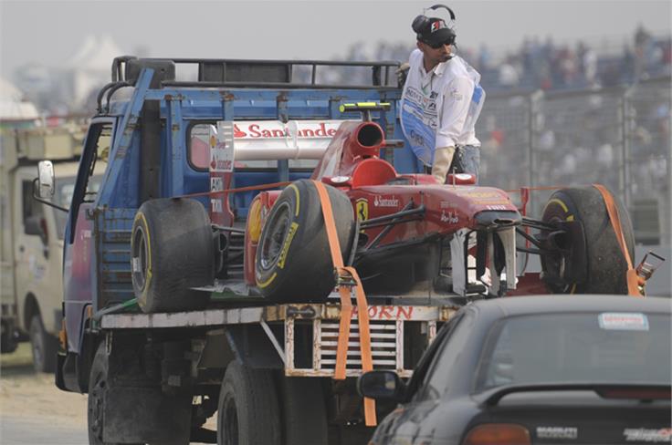 Ferrari in unfamiliar surroundings after crashing in qualifying.