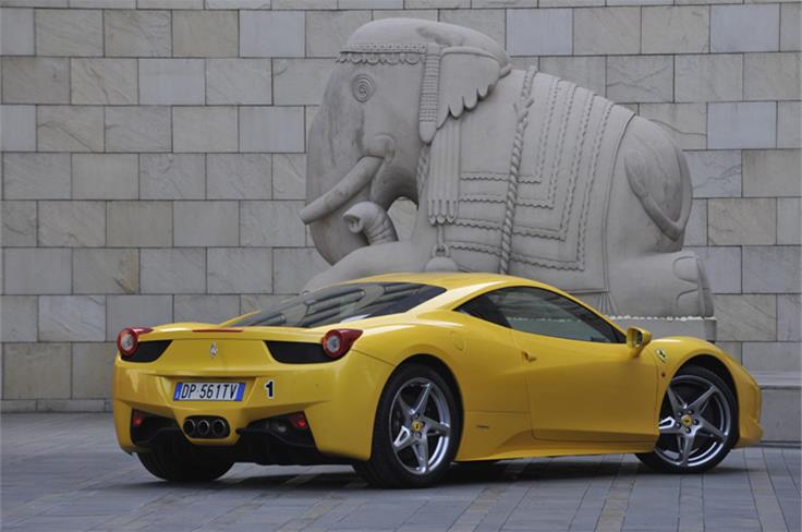 The 458 Italia&#8217;s triple exhaust pipes reminiscent of the legendary F40.