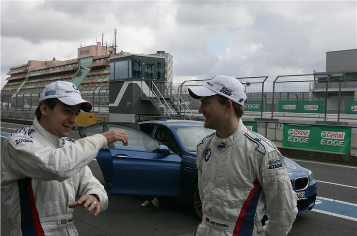 ... and that is how you go sideways. That's Augusto Farfus on the left and Dirk Werner on the right. Both are DTM drivers.