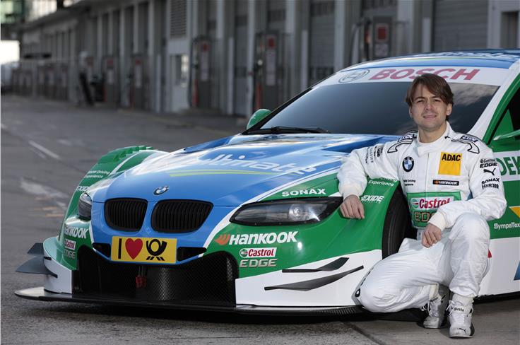 Augusto Farfus with the 2012 BMW DTM car.