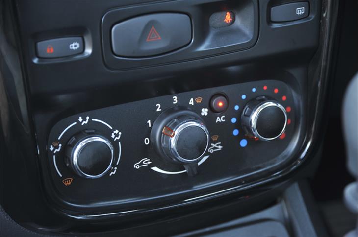 The AC controls don't look upmarket and are mechanical to operate.