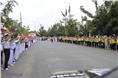 School children lined the streets to welcome the cars into Vietnam