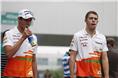 Force India drivers Adrian Sutil and Paul Di Resta in the paddock.