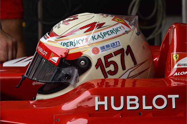 Alonso's helmet features his record of being F1's highest points' scorer of all times.