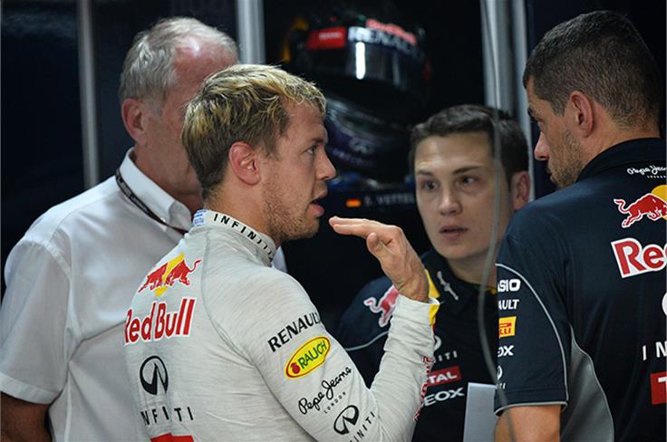 Sebastian Vettel in the Red Bull garage during practice.