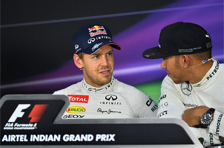 "Easy, yes?", says Vettel to Lewis.