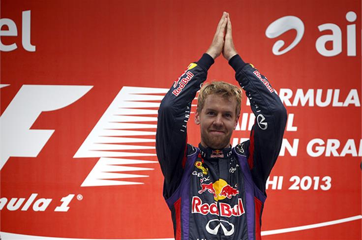 'Namaste India' - Vettel acknowledges the fans on the podium.