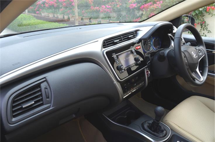 The all-new interiors with richer plastics, a piano black finish and sturdy vents on top of the dash.