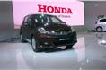 The Mobilio is based on a lengthened version of the Brio to accomodate a third row of seats. It will share its engines with the new Honda City
