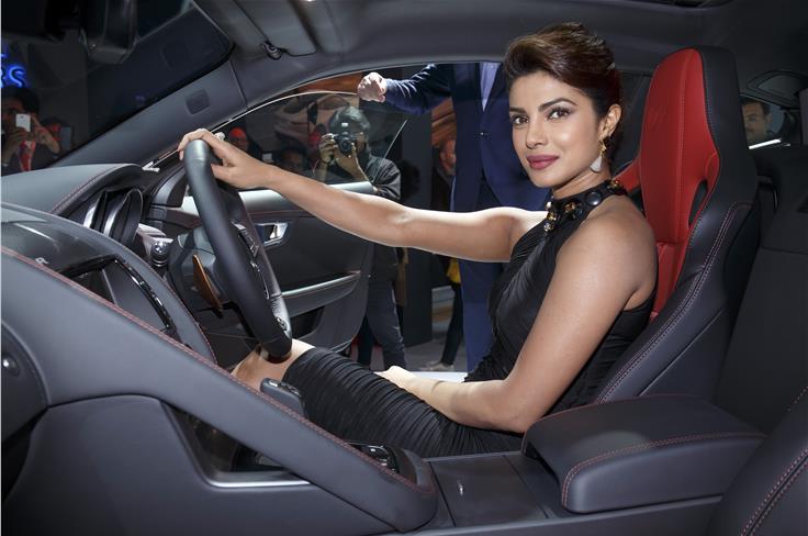 Priyanka Chopra behind the wheel of the new Jaguar F-type coupe.